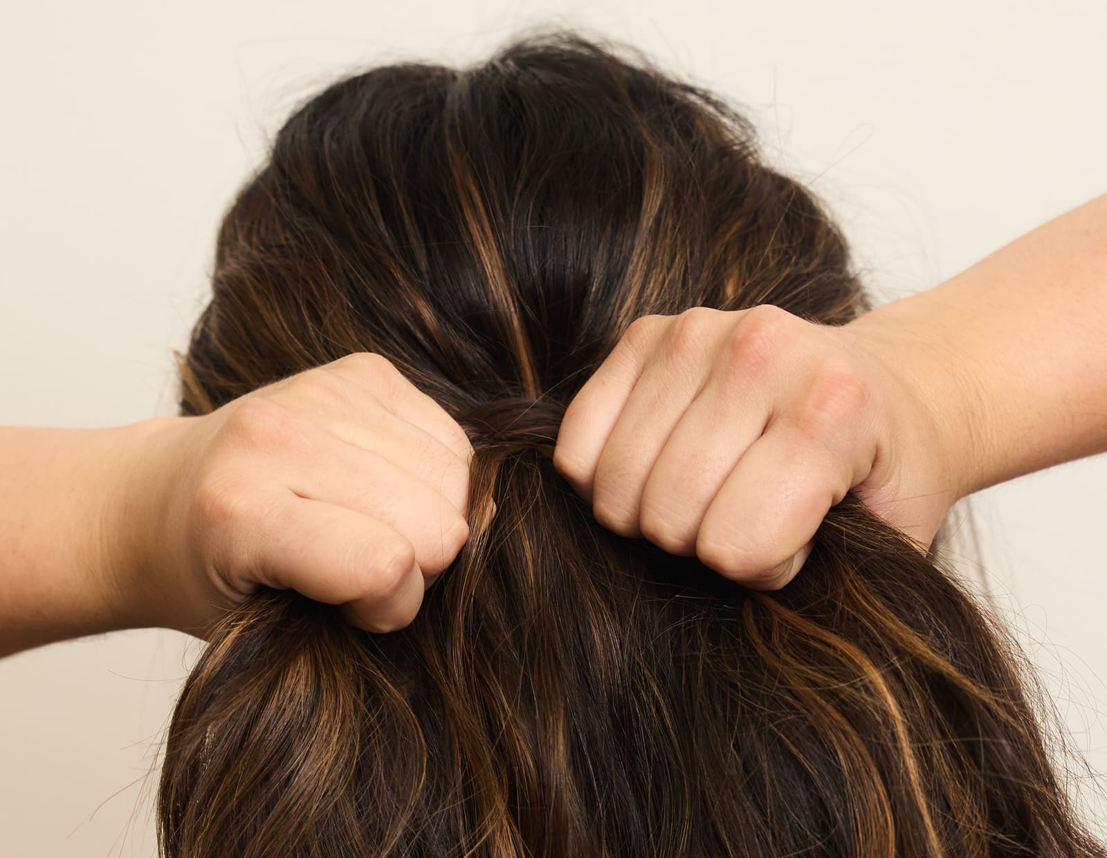 Image of Image of a girl holding her hair