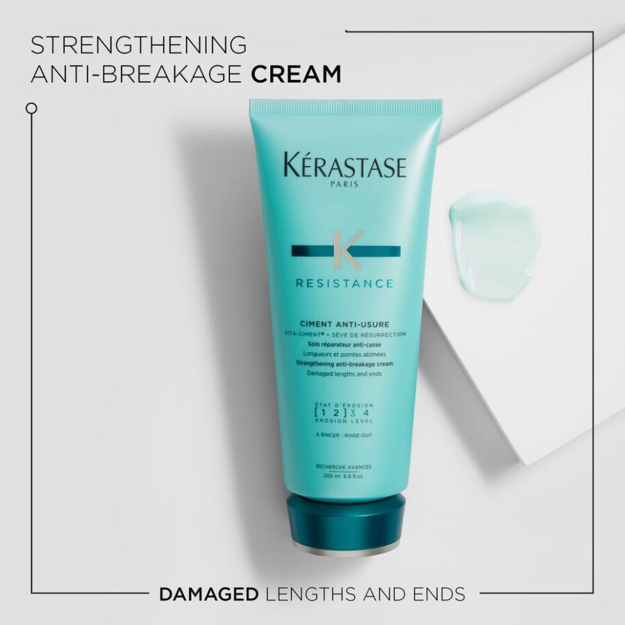 A tube of kérastase anti-breakage strengthening cream on a plain background with a focus on repairing damaged hair lengths and ends.