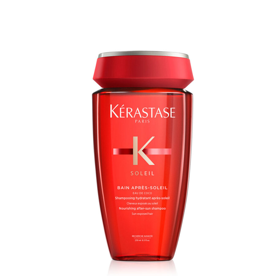 Red kérastase shampoo bottle for sun-exposed hair.
