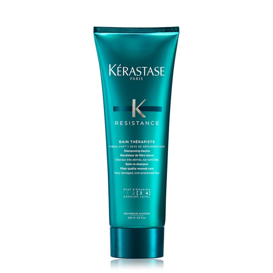 Kérastase resistance bain thérapiste shampoo tube on a white background.