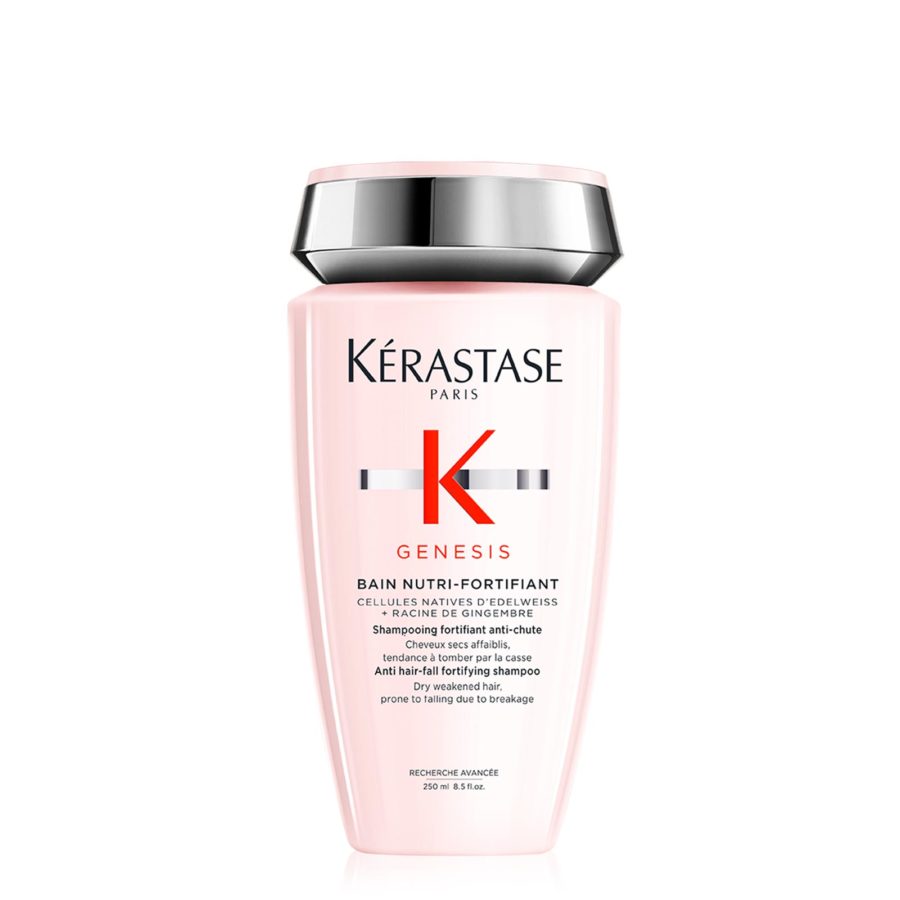 Bottle of kérastase paris genesis bain nutri-fortifiant shampoo against a white background.