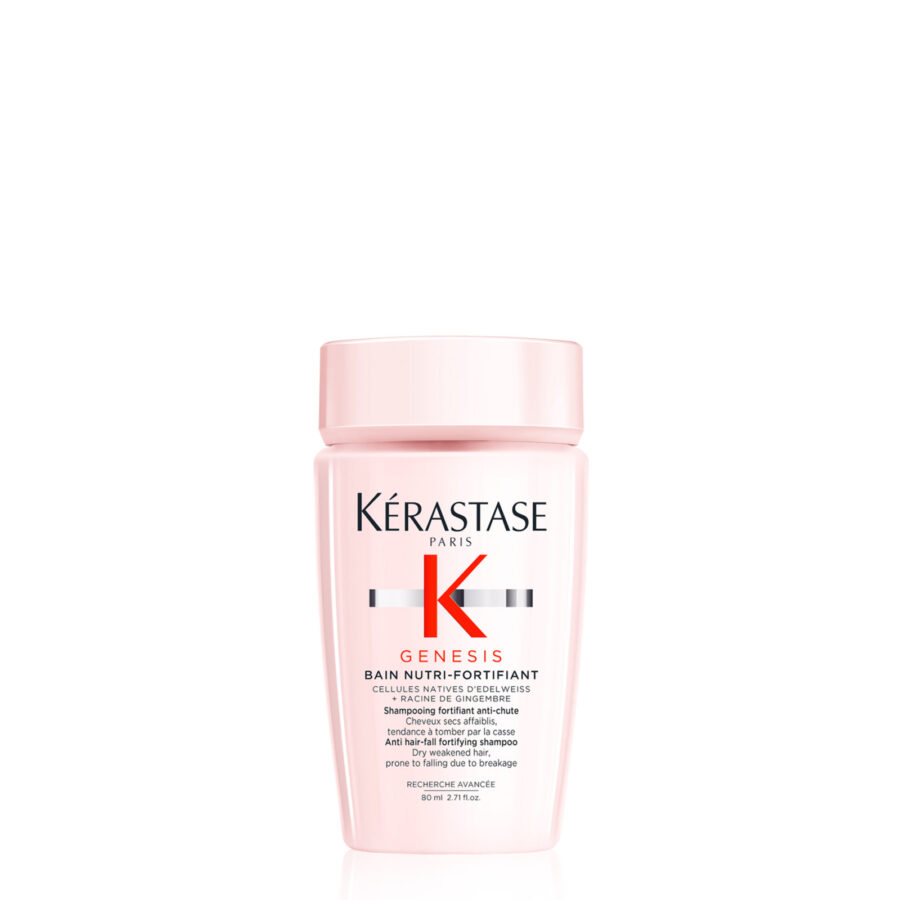 a travel size bottle of kérastase paris bain nutri-fortifiant shampoo on a white background.