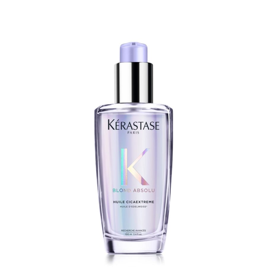 Bottle of kérastase blond absolu hair oil on a white background.