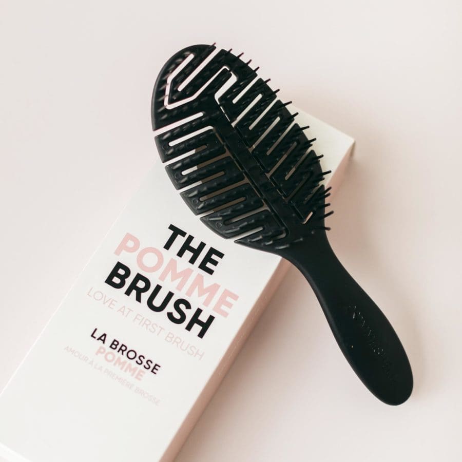 Pomme black detangling hair brush. Shop hair brushes at Pomme.