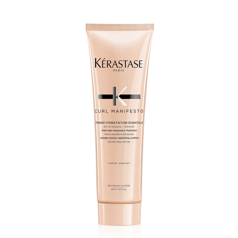A tube of kérastase paris curl manifesto lightweight moisture replenishing conditioner for curly hair.