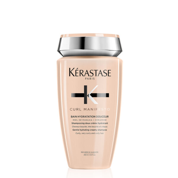 A bottle of kérastase paris curl manifesto bain hydration douceur shampoo for curly hair.