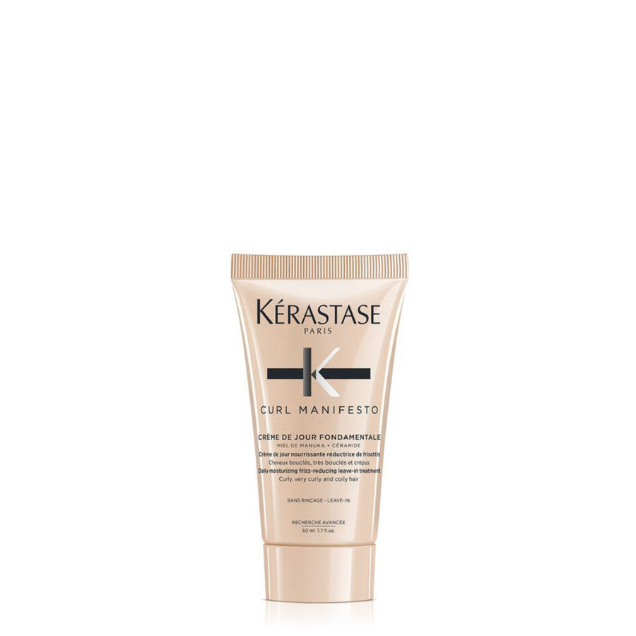 A tube of kérastase paris curl manifesto hair cream on a white background.