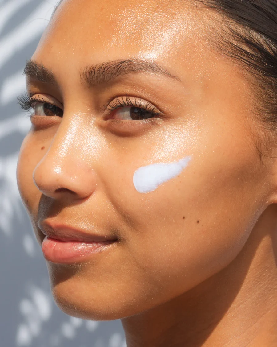 an image of a model with a swipe of the refreshing water cream on their face