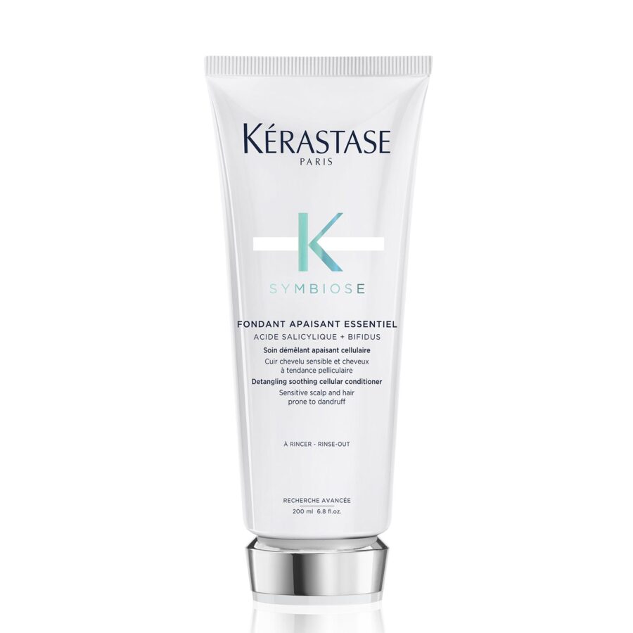 Kérastase paris fondant apaisant essentiel hair conditioner tube on a white background.