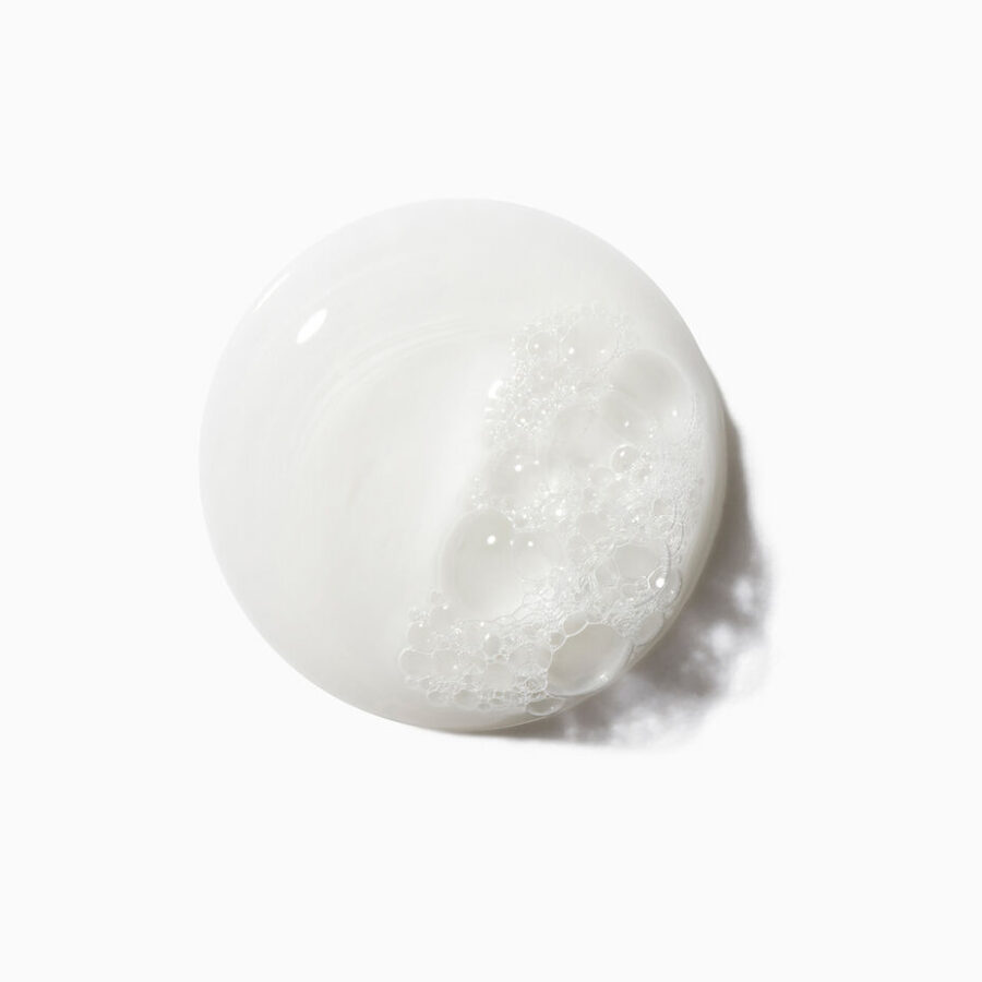 symbiose shampoo texture on a white background.