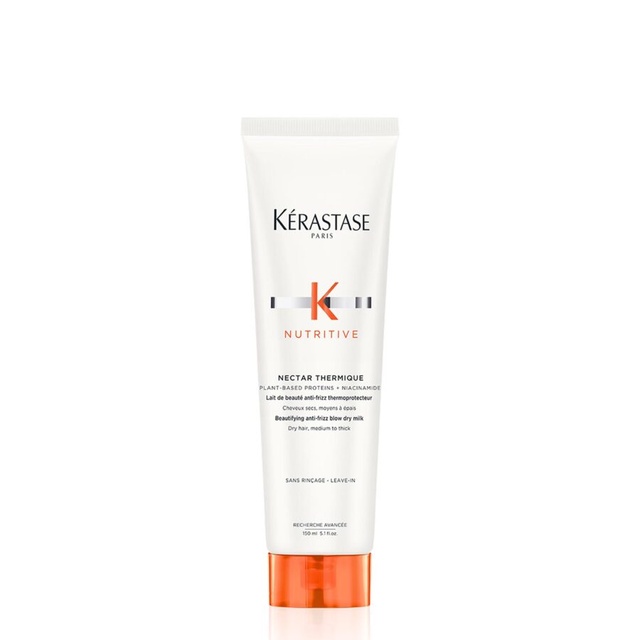A bottle of kérastase nutritive nectar thermique hair care product on a white background.