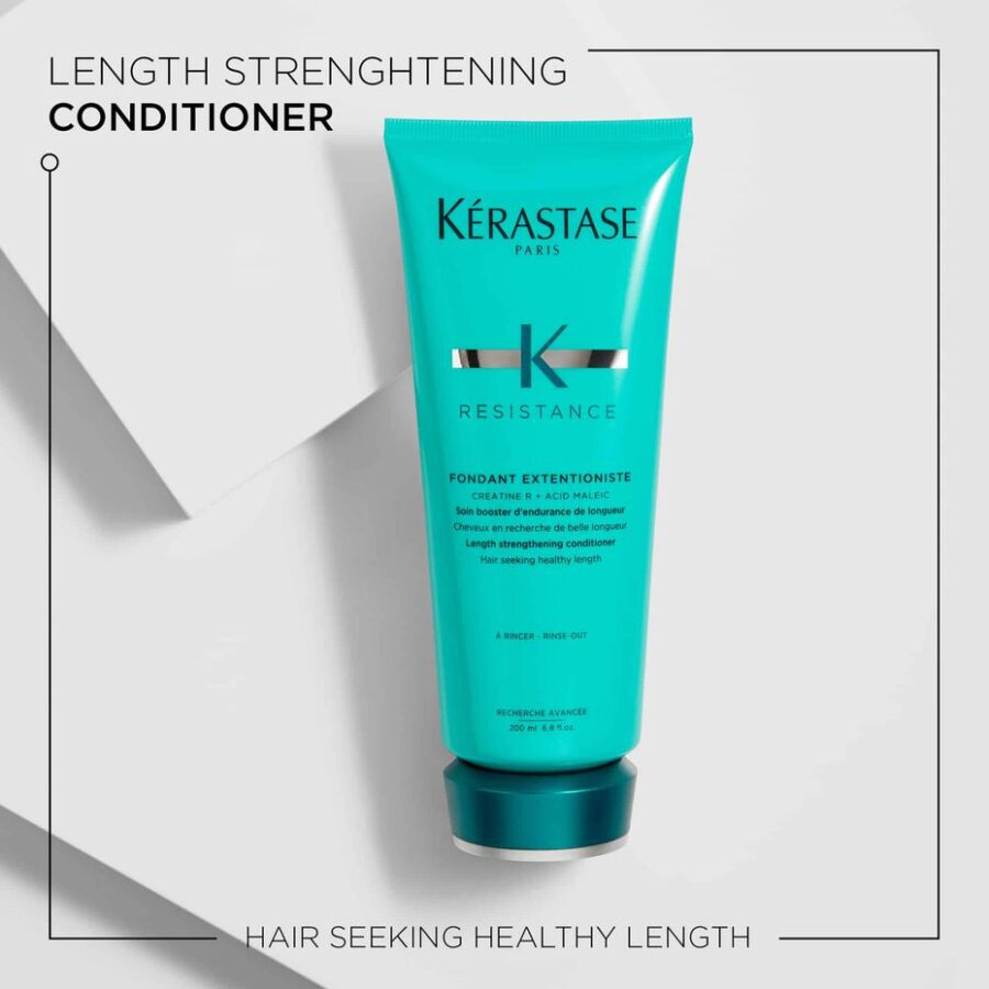 A bottle of kérastase resistance length strengthening conditioner for hair.